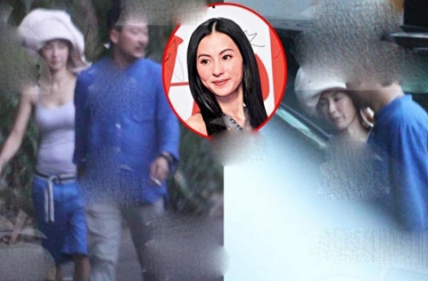 张柏芝带2个宝贝儿子与神秘男外出  小腹微突……