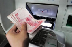 ŮȡǮû忨ATM³ 9800Ԫʧ