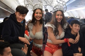 比基尼空姐迎越南男足凯旋 搔首弄姿引众怒